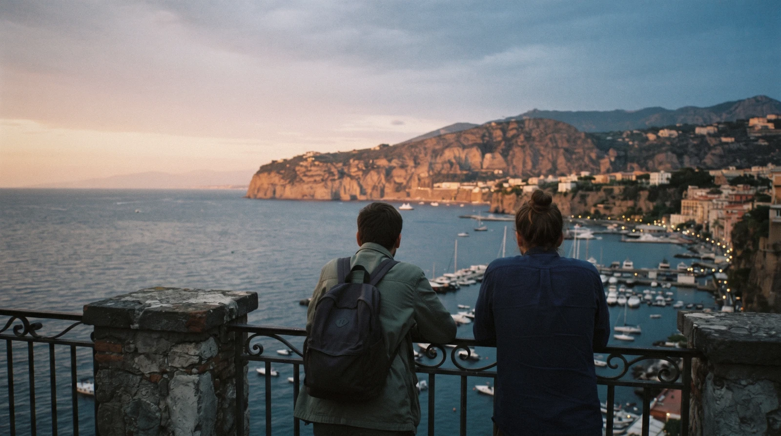 The sunset over the Bay of Naples from the free public terrace of the Villa Comunale gardens