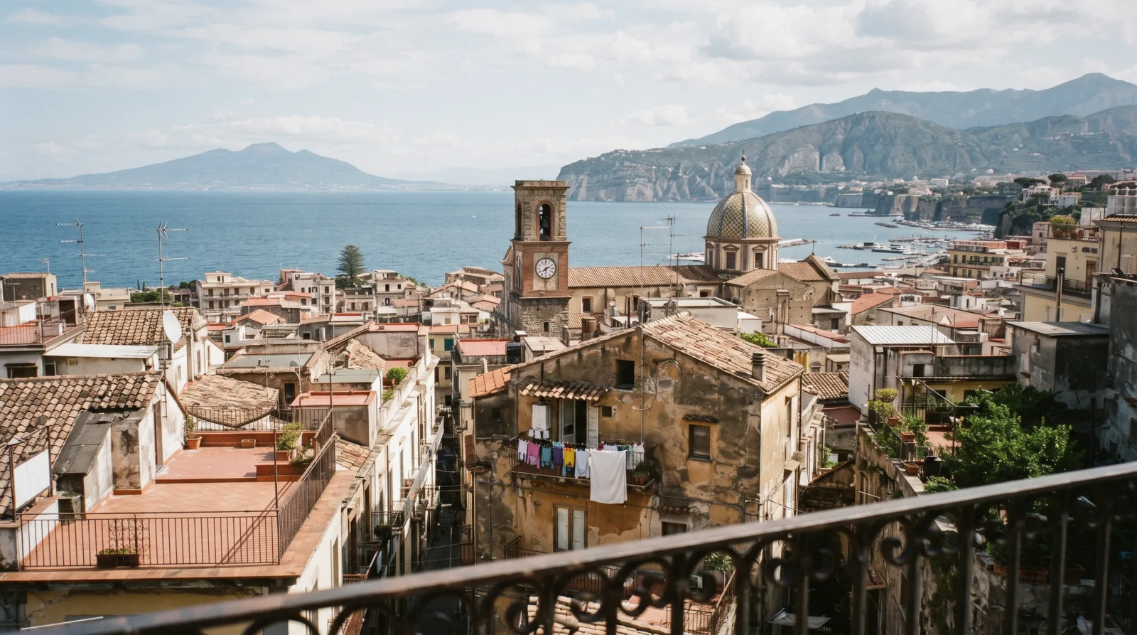 Rooftops and church domes of Sorrento seen from the Villa Comunale overlook in mid-morning light
